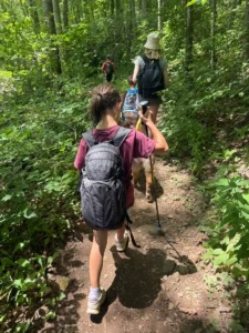 Child hiking on a trail near Blowing Rock NC in summer